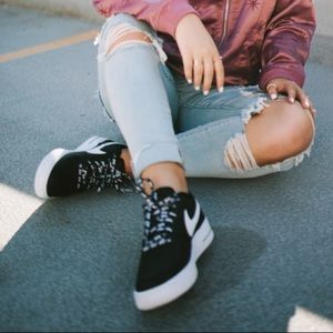 Black Nike Air Force Ones